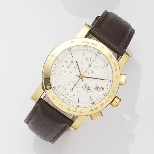 Girard Perregaux. An 18k gold automatic calendar chronograph wristwatch