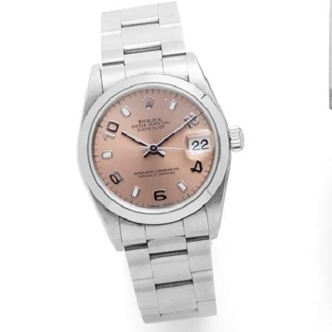 Rolex. A mid-size stainless steel automatic calendar bracelet watch