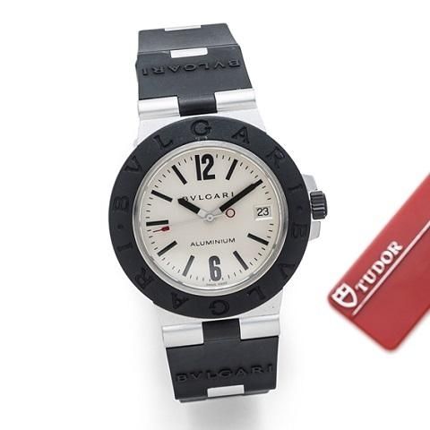 Bulgari. An aluminium automatic calendar bracelet watch with box and papers