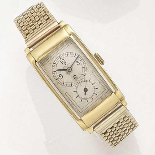 Rolex. A fine and rare two colour 18K gold manual wind bracelet watch