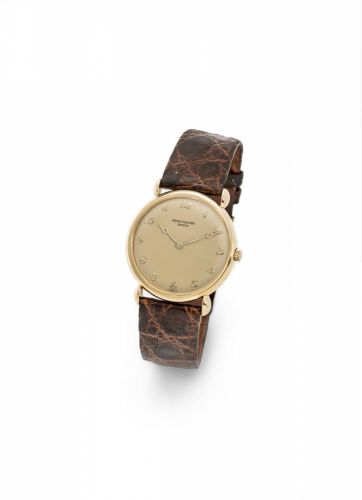 Patek Philippe. An 18K gold manual wind wristwatch