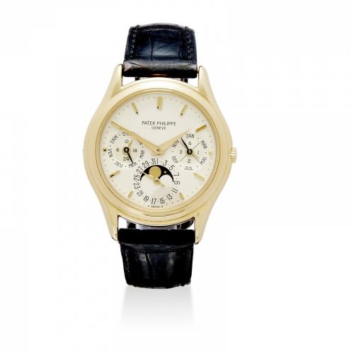 Patek Philippe. A fine 18K gold automatic wristwatch with perpetual calendar and moon phase