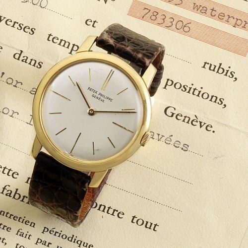Patek Philippe. An 18K gold manual wind wristwatch