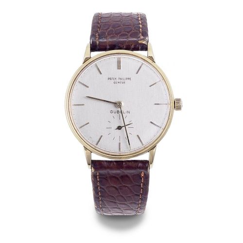 Patek Philiipe. An 18K gold manual wind wristwatch