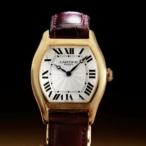 Cartier. An 18K rose gold manual wind wristwatch