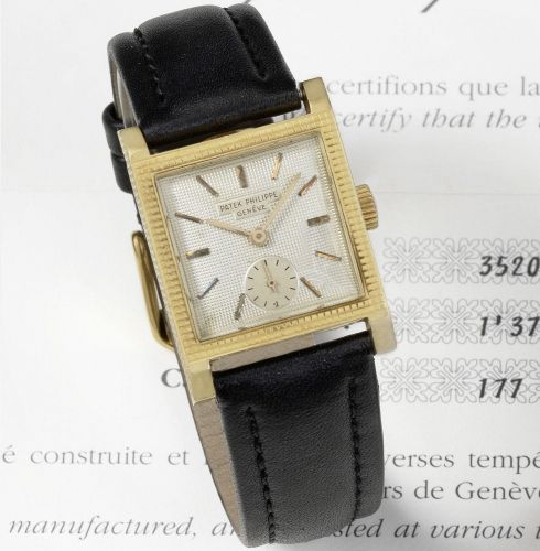 Patek Philippe. An 18K gold manual wind square wristwatch