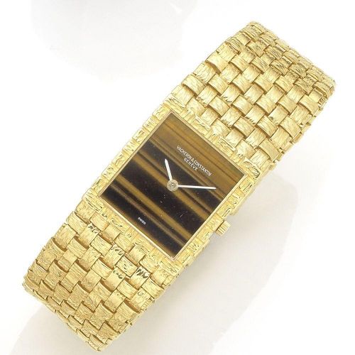Vacheron Constantin. An 18k gold and tigers eye manual wind bracelet watch