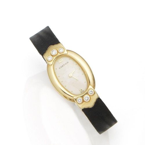Cartier. A lady's 18K gold and diamond set quartz wristwatch