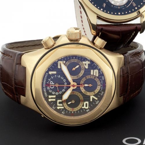 Girard-Perregaux. An 18K gold automatic calendar chronograph wristwatch