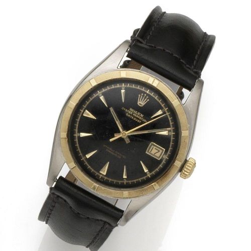 Rolex. A stainless steel automatic calendar wristwatch