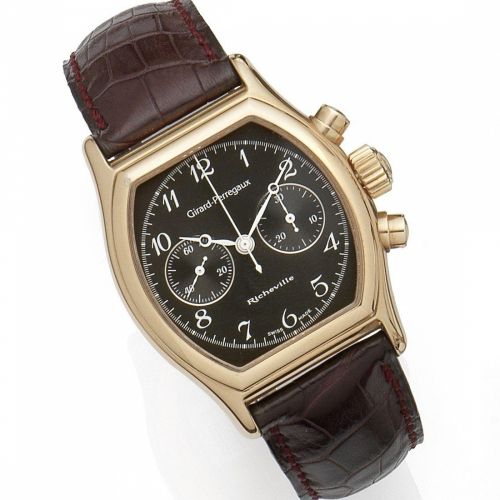 Girard-Perregaux. An 18K gold manual wind calendar wristwatch