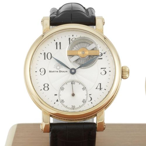 Martin Braun. An 18K rose gold manual wind wristwatch