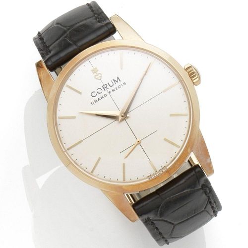Corum. An 18K gold manual wind limited edition wristwatch
