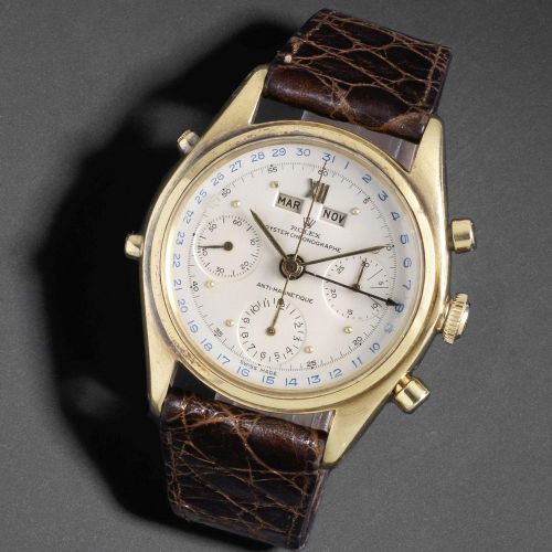 Rolex. A very rare 18K gold manual wind 'Jean Claude Killy' triple calendar chronograph wristwatch