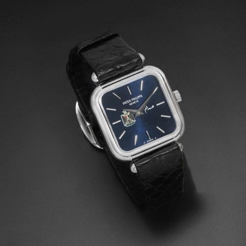 Patek Philippe. A lady's 18K white gold cushion form manual wind wristwatch