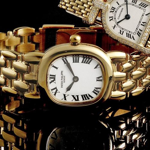 Patek Philippe. A lady's 18K gold quartz bracelet watch