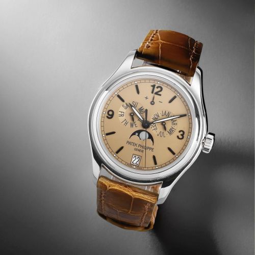 Patek Philippe. A fine and unusual platinum automatic annual calendar wristwatch with moon phase and power reserve and special escapement
