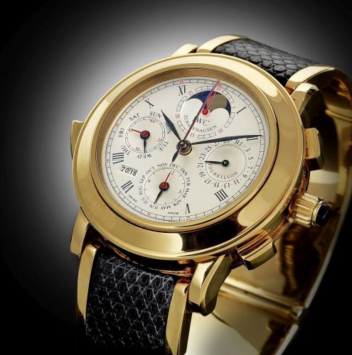 IWC. A fine and rare Limited Edition 18k gold perpetual calendar minute repeating split seconds chronograph tourbillon wristwatch with moonphase
