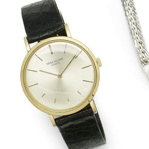 Patek Philippe. An 18K gold manual wind wristwatch