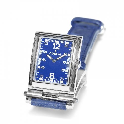 Corum. A stainless steel quartz rectangular wristwatch with folding case
