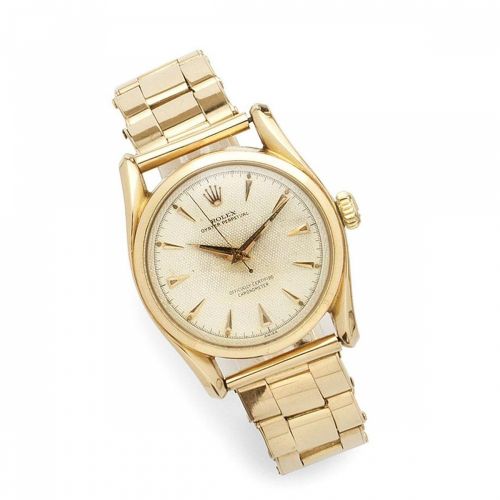 Rolex. An 18K rose gold automatic bracelet watch
