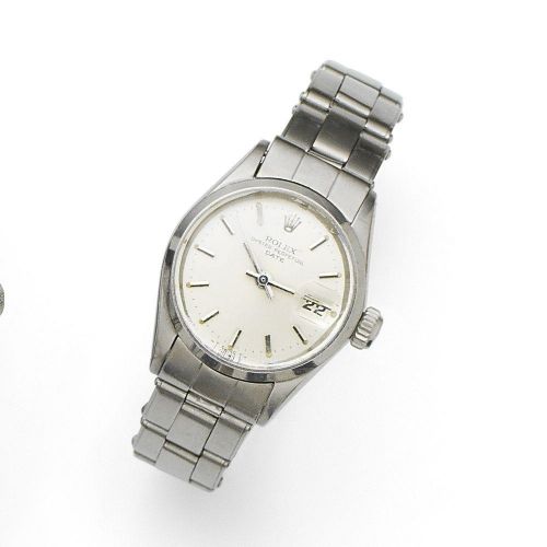 Rolex. A lady's stainless steel automatic calendar bracelet watch
