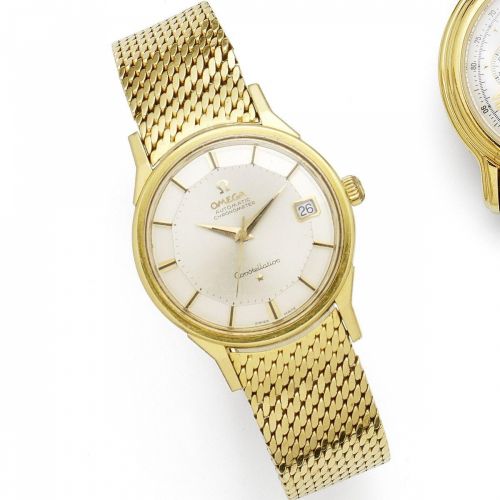 Omega. An 18k gold automatic calendar bracelet watch
