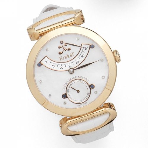 Korloff. An 18K gold manual wind wristwatch with retrograde minutes