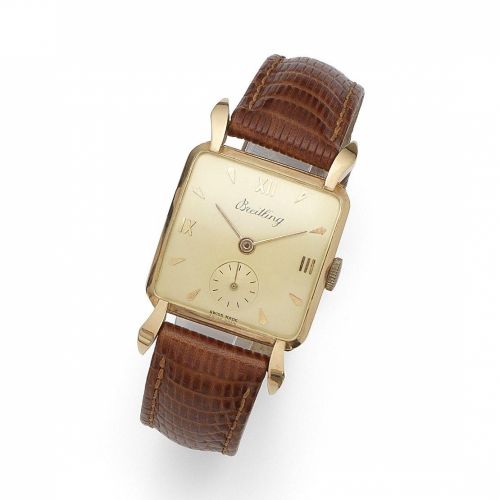 Breitling. An 18K rose gold manual wind cushion form wristwatch