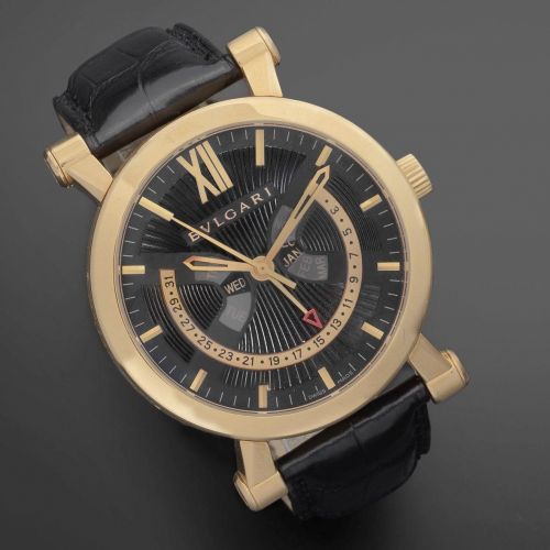 Bulgari. An 18K rose gold automatic retrograde triple calendar wristwatch