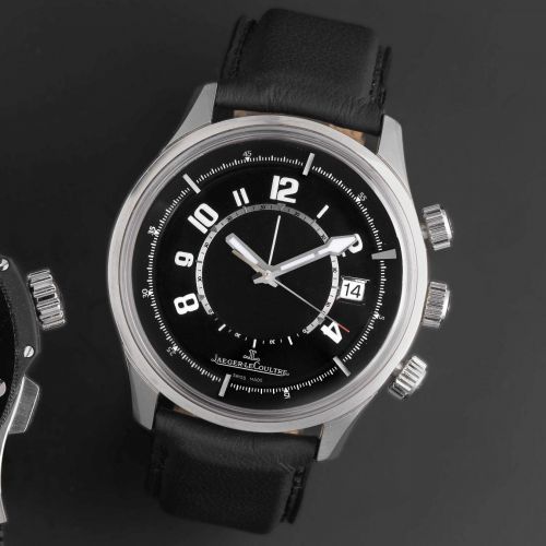 Jaeger-LeCoultre. A stainless steel automatic calendar alarm wristwatch
