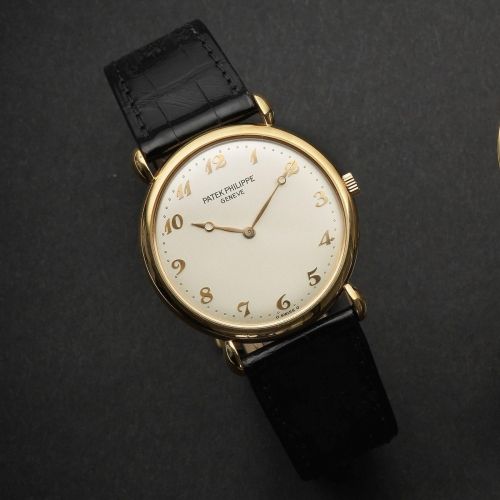 Patek Philippe. An 18K rose gold manual wind wristwatch