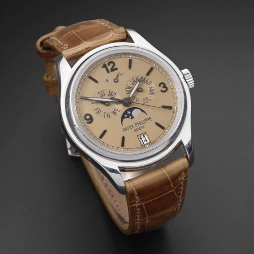 Patek Philippe. A fine and unusual platinum automatic annual calendar wristwatch with moon phase, power reserve and special escapement