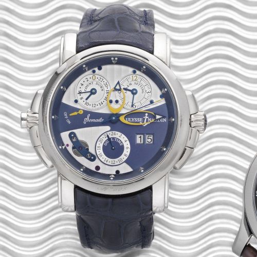 Ulysse Nardin. A fine and rare 18K white gold automatic wristwatch with dual time zone and alarm function