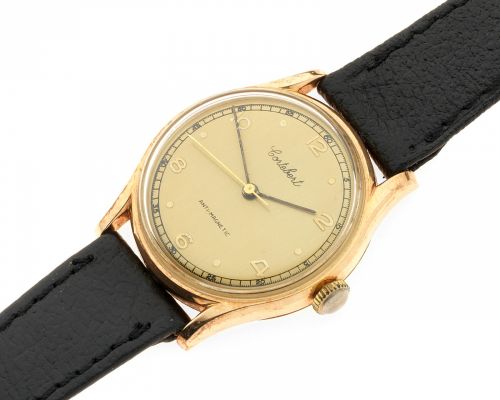 Cortebert. An 18K gold manual wind wristwatch