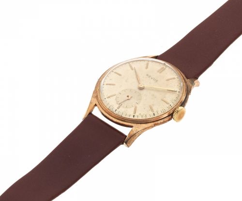 Revue. A rose gold plated and stainless steel manual wind wristwatch