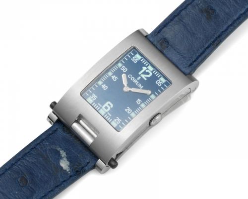 Corum. A stainless steel quartz rectangular wristwatch with folding case