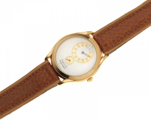 Auguste Reymond. A gold plated manual wind jump hour wristwatch