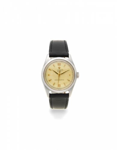 Rolex. A stainless steel manual wind wristwatch