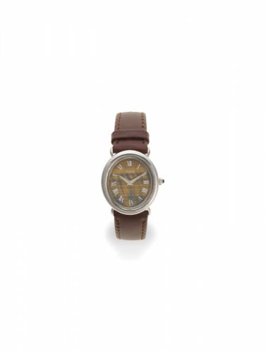 Piaget. A lady's 18k white gold manual wind wristwatch with tiger eye dial