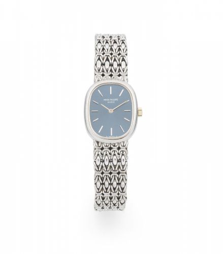 Patek Philippe. A lady's 18K white gold manual wind bracelet watch