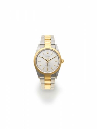 Rolex. A stainless steel automatic bracelet watch with winding box