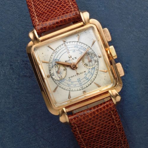 Rolex. An 18K rose gold manual wind chronograph square wristwatch