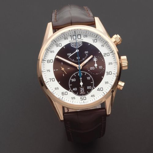 TAG Heuer. A fine and rare 18K rose gold automatic calendar chronograph wristwatch with 100th second precision