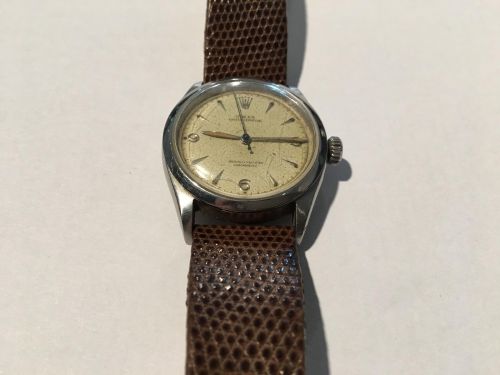 Rolex. A stainless steel automatic wristwatch