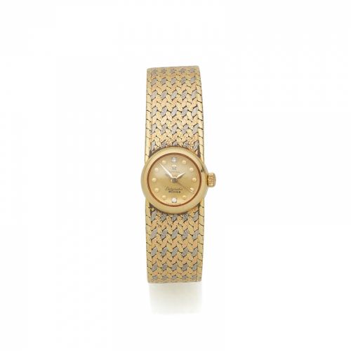 Omega. A lady's 18K gold automatic bracelet watch