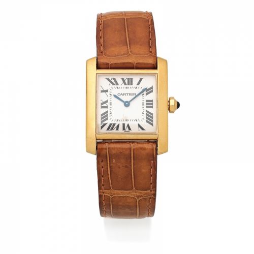 Cartier. A lady's 18K gold quartz wristwatch