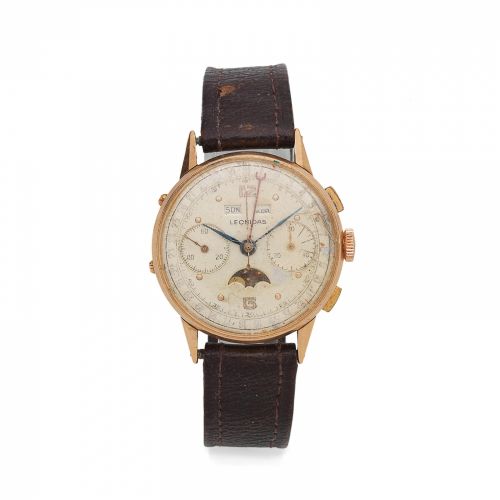 Leonidas. An 18K gold manual wind triple calendar chronograph wristwatch with moon phase