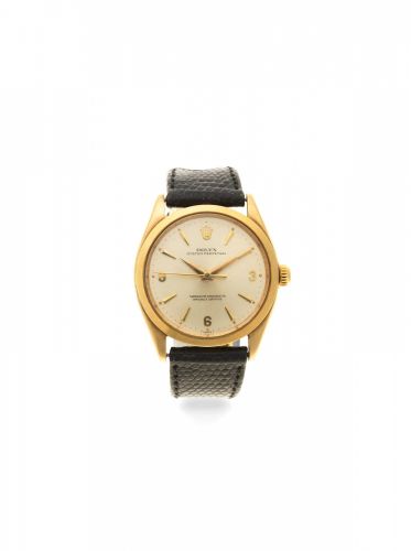 Rolex. A 9K gold automatic wristwatch