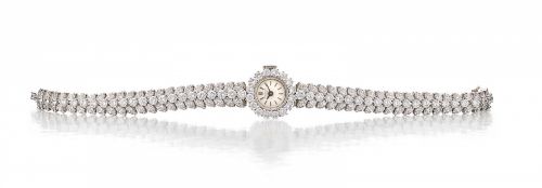Patek Philippe. A fine platinum and diamond lady's bracelet watch